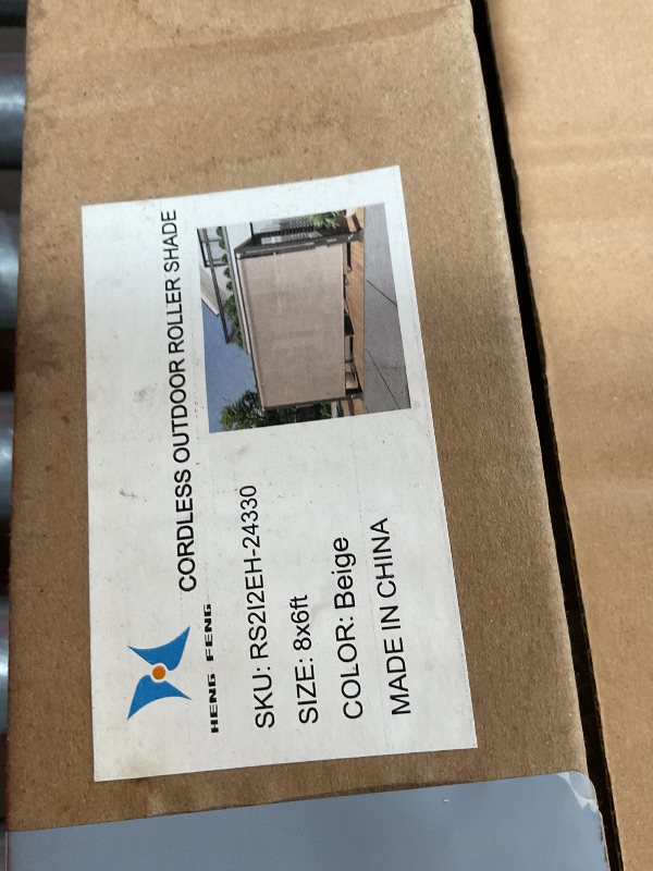 Photo 1 of **MISSING HARDWARE **Outdoor roller shade 8 x 6 beige