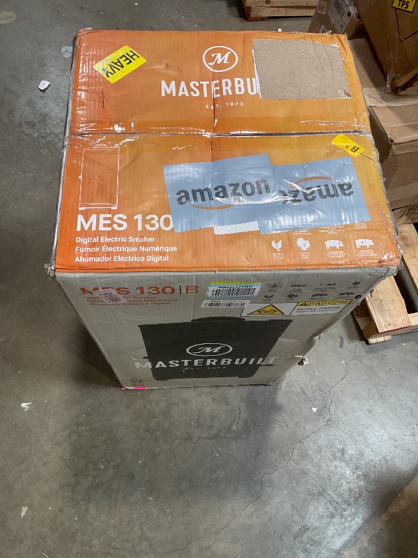 Photo 1 of **MISSING PARTS** Masterbuilt® 30-inch Digital Electric Vertical BBQ Smoker with Side Wood Chip Loader, Chrome Racks and 710 Cooking Square Inches in Black, Model MB20071117