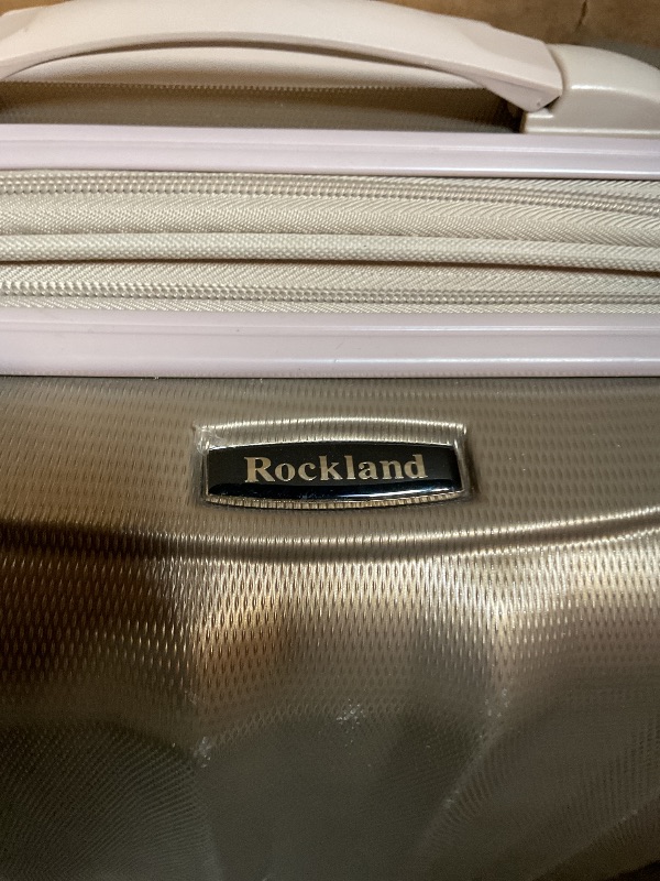 Photo 1 of ***FOR PARTS ONLY/DAMAGED WHEELS & BAG *** Rockland Melbourne Hardside Expandable Luggage with Spinner Wheels, Bronze, Carry-On 20"