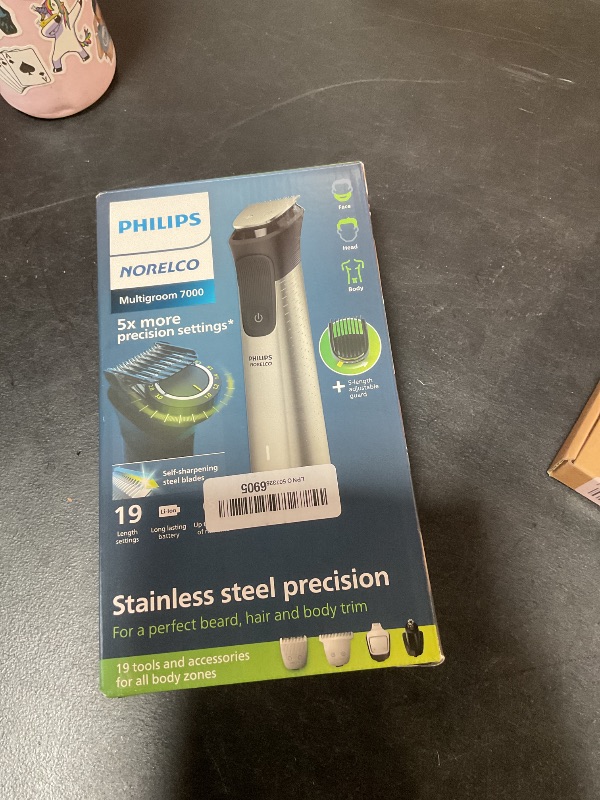 Photo 1 of ***MISSING CHARGER CABLE*** Norelco Philips Multigroom 7000 Series, All-in-One Trimmer, Beard Trimmer and Hair Clipper, 19-Piece Men's Grooming Kit for Beard, Head, Hair, Body, and Face, Soft Pouch, MG7910/49