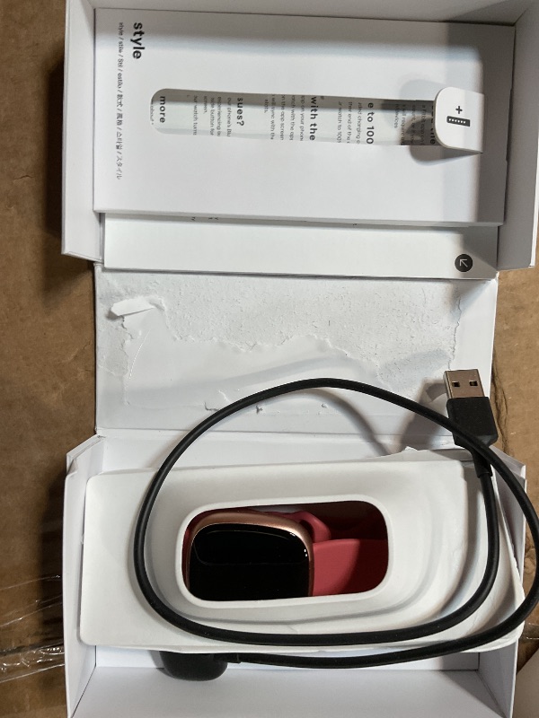 Photo 1 of ***FOR PARTS/ NON-FUNCTIONAL*** Fitbit Versa 4 Fitness Smartwatch with Daily Readiness, GPS, 24/7 Heart Rate, 40+ Exercise Modes, Sleep Tracking and more, Pink Sand/Copper Rose, One Size (S & L Bands Included)