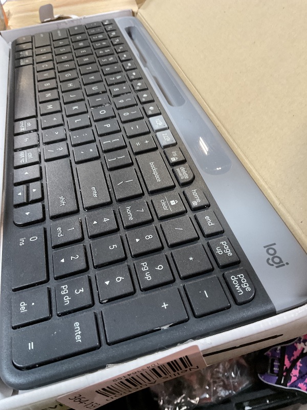 Photo 1 of ** keyboard only**Logitech K585 Multi-Device Slim Wireless Keyboard, Built-in Cradle for Device; for Laptop, Tablet, Desktop, Smartphone, Win/Mac, Bluetooth/Receiver, Compact, Easy Switch, 24 Month Battery - Graphite