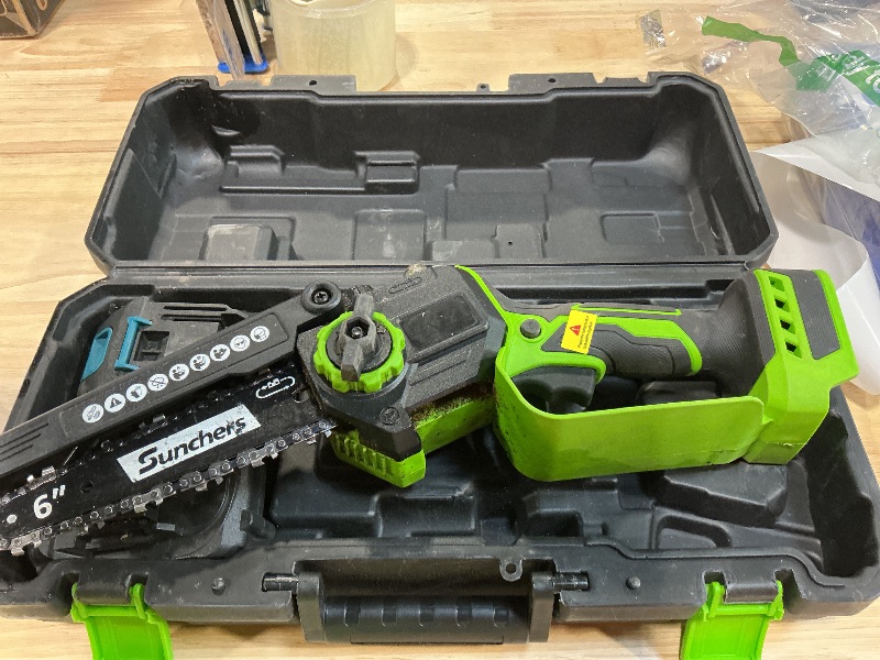 Photo 1 of **MISSING CHARGER*** Mini Chainsaw Cordless, 6 Inch Electric Chainsaw with 2 Battery, Handheld Battery Powered Chain Saw with Auto Oiler, Garden Tools Saw for Wood Cutting Tree Cutter, Holiday Gifts for Men, Dad, Husband