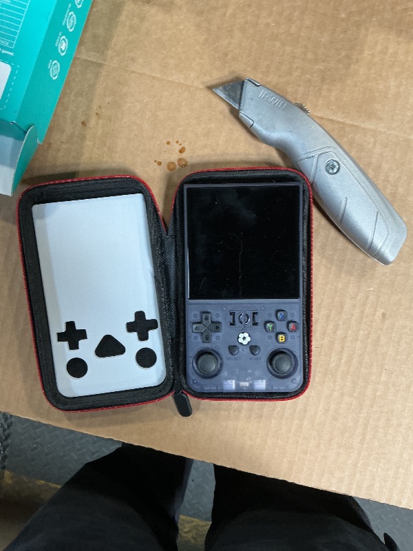 Photo 1 of ?R36MAX 4000mAh Portable Rechargeable Handheld Retro Game Console,Comfort Non-Slip Handheld Standing Retro Game Console with 64G TF Car,4.0-inch Screen,for Office,Purple Gray