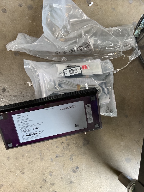 Photo 1 of ** MAJOR DAMAGE TO SCREEN. SELLING FOR PARTS.**Samsung 85" The Frame Pro LS03FW 4K Neo QLED TV (2025) Bundle with Modern Teak Bezel, CPS 26 Month Protection, Slim Flat Mount, 2X HDMI Cables & Deco Gear Complete Home Theater Beginner's Guidebook