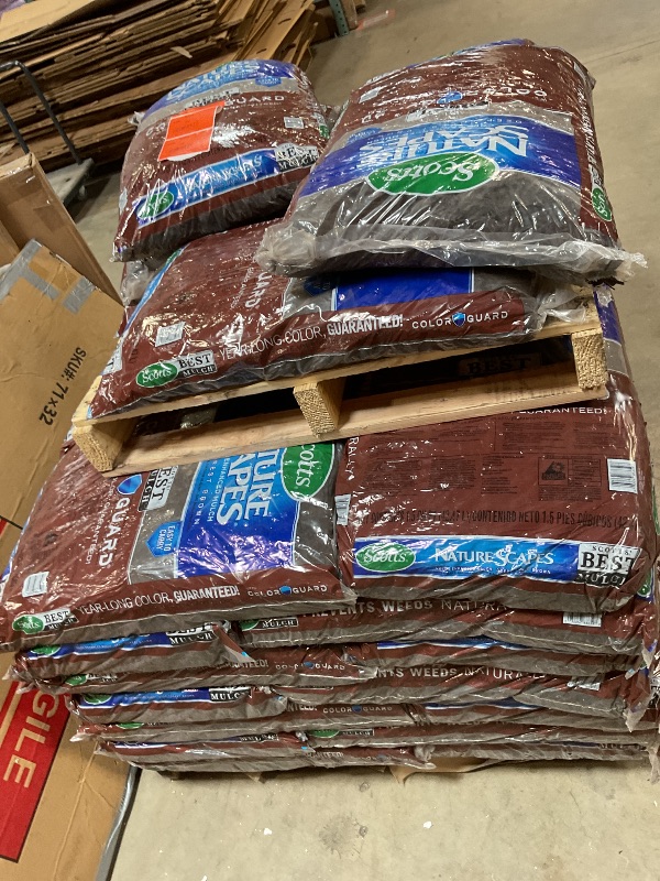 Photo 1 of ** WILL NEED A TRUCK FOR PICK UP. MINOR DAMAGE TO SOME BAGS LEAKING.**39 bags of Scotts Nature Scapes Deep Forest Brown Weed Preventer Color Enhanced Mulch 1.5 cu ft