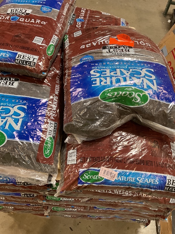 Photo 1 of ** WILL NEED A TRUCK FOR PICK UP. MINOR DAMAGE TO SOME BAGS LEAKING.**39 bags of Scotts Nature Scapes Deep Forest Brown Weed Preventer Color Enhanced Mulch 1.5 cu ft