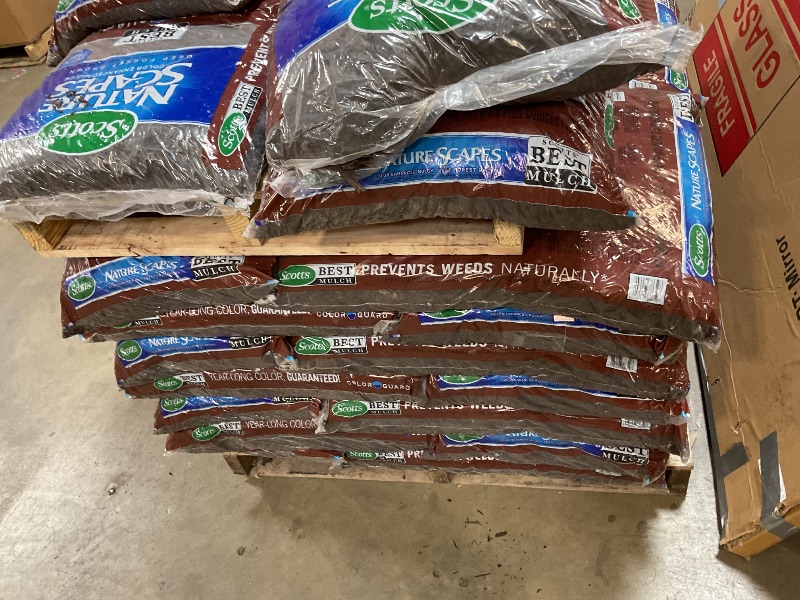 Photo 1 of ** WILL NEED A TRUCK FOR PICK UP. MINOR DAMAGE TO SOME BAGS LEAKING.**39 bags of Scotts Nature Scapes Deep Forest Brown Weed Preventer Color Enhanced Mulch 1.5 cu ft