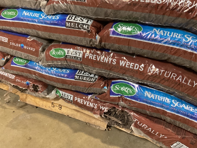 Photo 1 of ** WILL NEED A TRUCK FOR PICK UP. MINOR DAMAGE TO SOME BAGS LEAKING.**39 bags of Scotts Nature Scapes Deep Forest Brown Weed Preventer Color Enhanced Mulch 1.5 cu ft