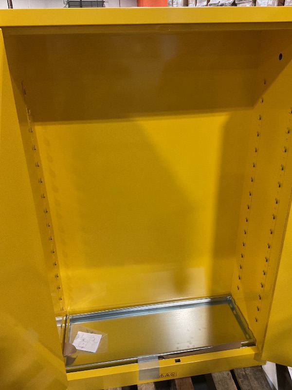 Photo 1 of **DENTS/SCRATCHES/SCRAPES FROM TRANSPORT**Justrite 45 Gallon Manual Close Flammable Storage Cabinet, 18 Gauge Steel, 2 Shelves, 2 Door Fire Cabinet, 65" x 43" x 18", Made in The USA, Yellow, 894500