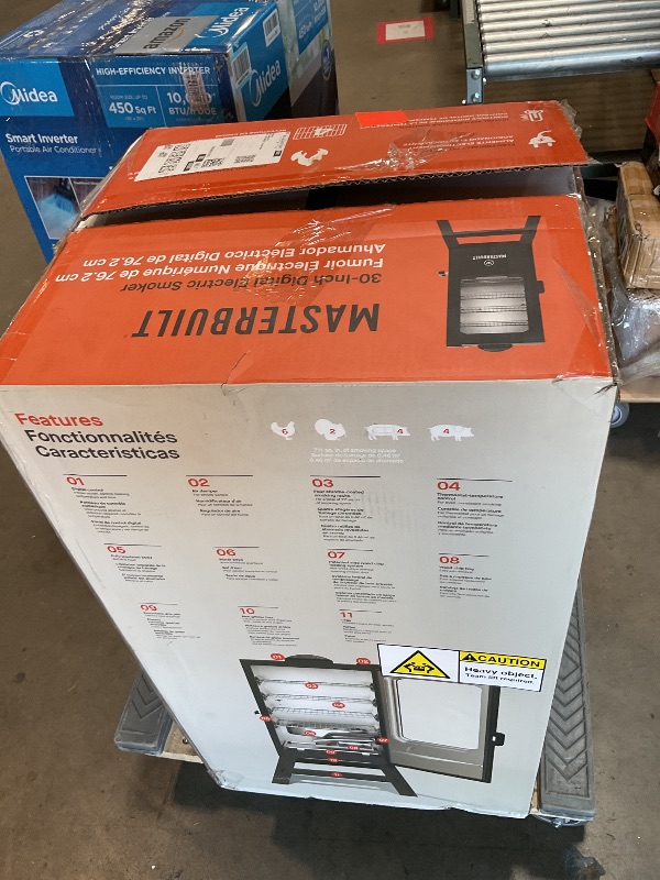 Photo 1 of *** USED/MAJOR DAMAGE/UNKNOWN MISSING PARTS***Masterbuilt® 30-inch Digital Electric Vertical BBQ Smoker with Leg Kit, Side Wood Chip Loader and 710 Cooking Square Inches in Black, Model MB20070421