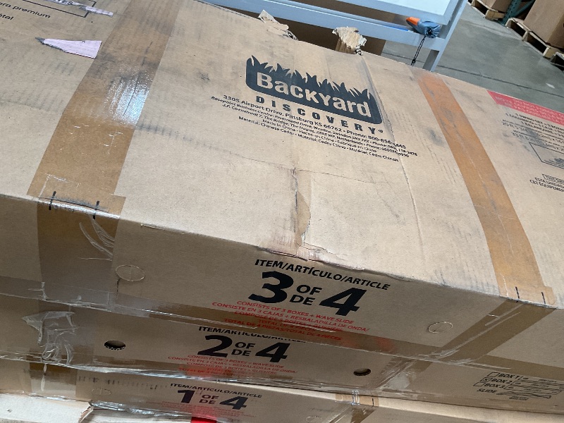 Photo 1 of *** HAS SCRATCHES/ SELLING AS PARTIAL SET.THREE BOXES. MISSING SLIDE* ** Backyard Discovery Sterling Point Cedar Wood Swing Set with Wave Slide, Raised Clubhouse, Wooden Bridge, Rock Wall, Belt Swings, Web Swing, Trapeze, Balcony, Climbing Wall, Ladder, O