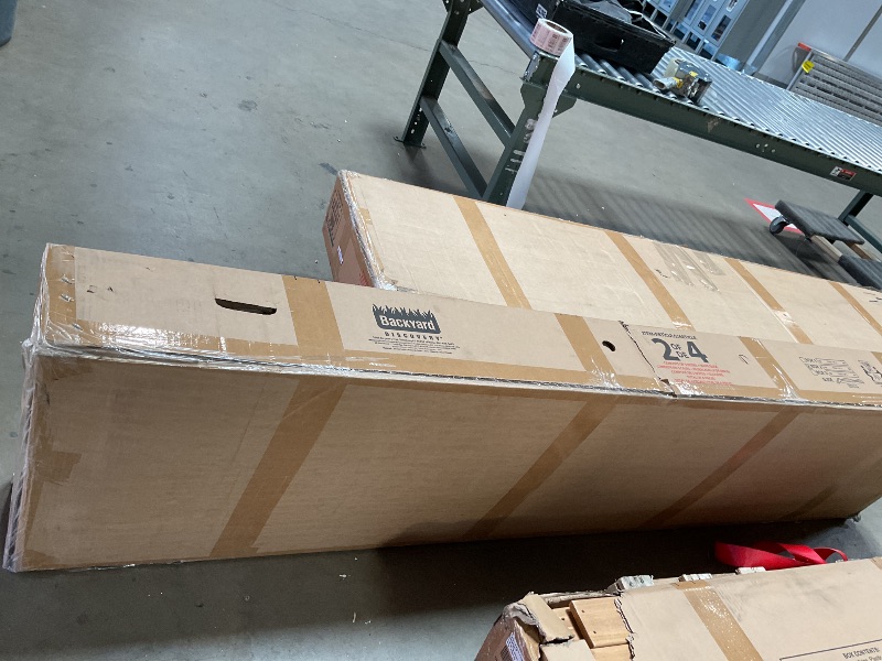 Photo 1 of *** HAS SCRATCHES/ SELLING AS PARTIAL SET.THREE BOXES. MISSING SLIDE* ** Backyard Discovery Sterling Point Cedar Wood Swing Set with Wave Slide, Raised Clubhouse, Wooden Bridge, Rock Wall, Belt Swings, Web Swing, Trapeze, Balcony, Climbing Wall, Ladder, O