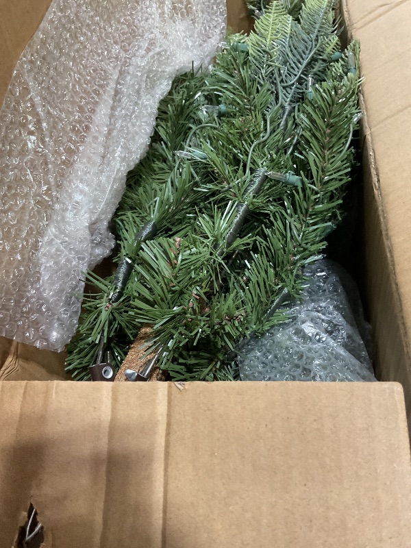 Photo 1 of **STYLE MAY DIFFER FROM STOCK PHOTO/LIGHTS ARE NON-FUNCTIONAL*** Puleo International 4.5ft Pre-Lit Slim Aspen Fir Artificial Christmas Tree with 200 Clear Lights, 389 Realistic Dense Branch Tips, Easy Setup Artificial Trees with Sturdy Metal Stand