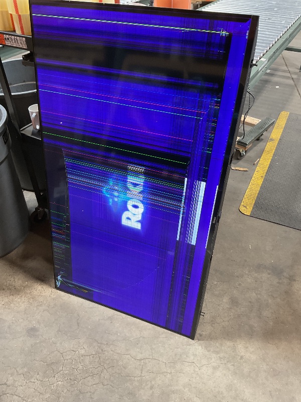 Photo 1 of **MAJOR DAMAGE TO SCREEN. SELLING FOR PARTS**Roku Smart TV 2025 – 55-Inch Select Series, 4K HDR TV – Roku TV with Enhanced Voice Remote – Flat Screen LED Television with Wi-Fi for Streaming Live Local News, Sports, Family Entertainment