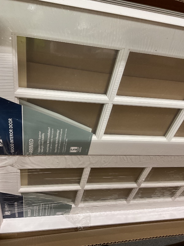 Photo 1 of **MINOR DAMAGE BOTTOM CORNER**National Door Company Z019952BA Primed MDF 10 Lite Clear Glass