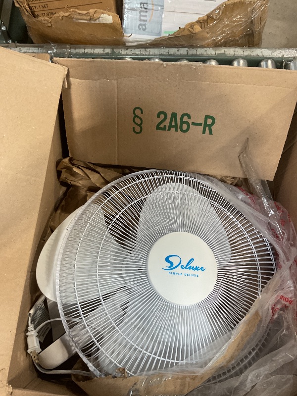 Photo 1 of **POSSIBLY FOR PARTS /ISSUES FUNCTIONING *** Simple Deluxe 16 Inch Wall Mount Fan with Remote Control, 3 Oscillating Modes, 3 Speed, Timer, 1 Pack