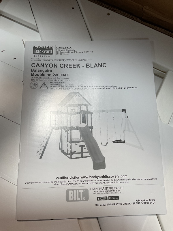 Photo 1 of *3 ITEM SET Backyard Discovery Canyon Creek White Cedar Wood Swing Set with Wave Slide, Clubhouse, Play Kitchen, Picnic Area, Belt Swings, Web Swing, Rock Wall, Balconies, Playhouse, Step Ladder, Outdoor Playset