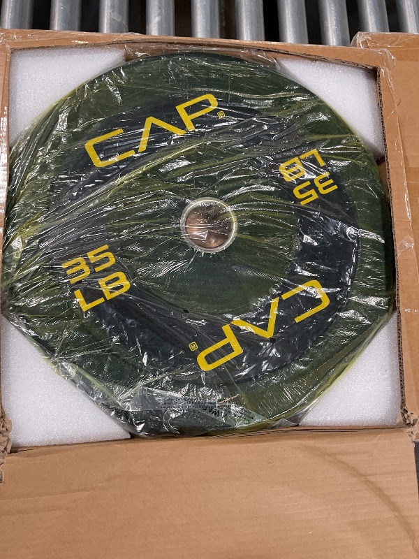Photo 1 of Cap Barbell get Olympic Bumper Plate with Yellow Logo, Black, 35 lb Single