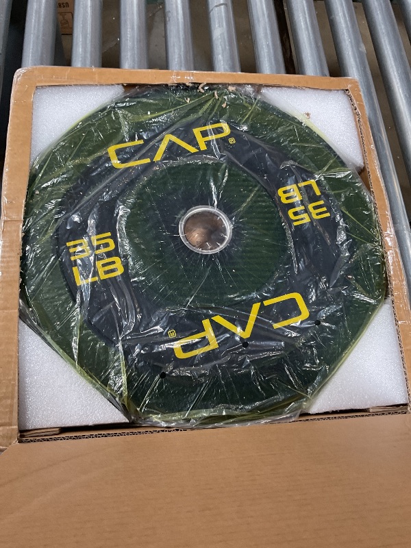 Photo 1 of Cap Barbell get Olympic Bumper Plate with Yellow Logo, Black, 35 lb Single