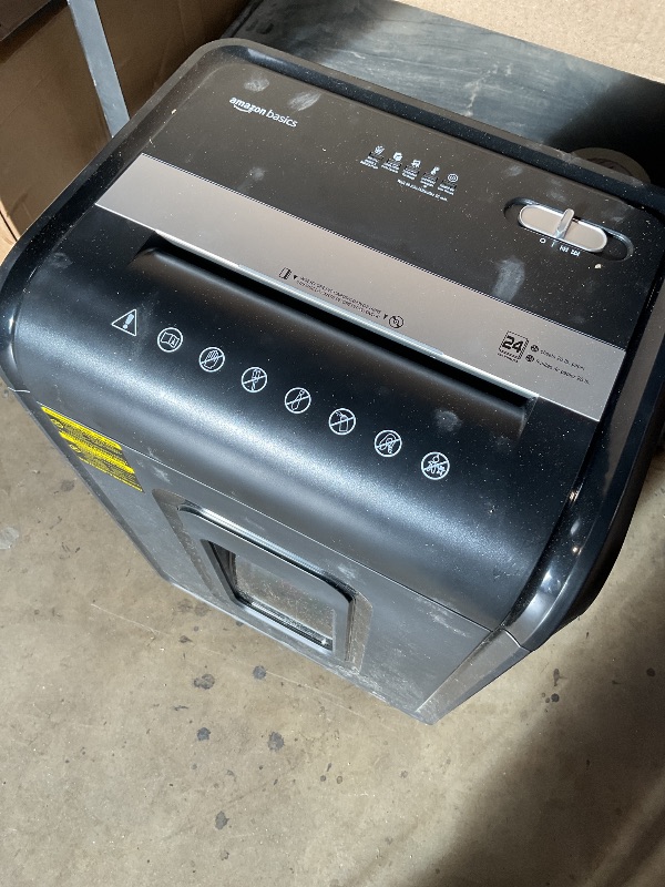 Photo 1 of * TURNS ON, UNSURE IF OPERATIONAL * Amazon Basics 24 Sheet Cross Cut Paper, CD and Credit Card Home Office Shredder with Pullout Basket, Black