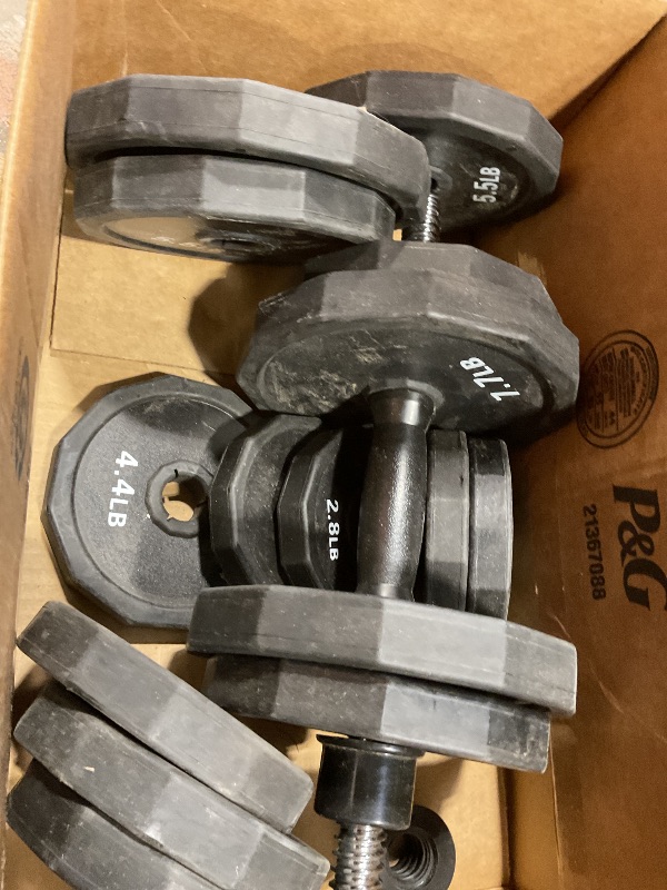 Photo 1 of **DIRT AND SCUFFS**Dumbbell set