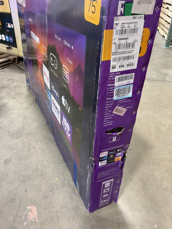 Photo 1 of **SELLING FOR PARTS. MAJOR DAMAGE TO SCREEN. MISSING REMOTE AND POWER CORD** Roku Smart TV – 75-Inch Plus Series 4K QLED RokuTV with Roku Voice Remote Pro