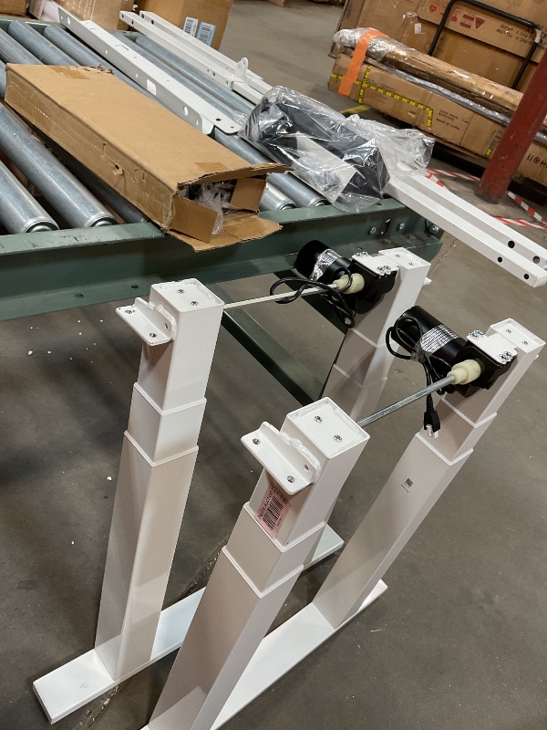 Photo 1 of **TRANSPORT SCRATCHES AND SCUFFS**Flexispot white metal table legs and installation parts