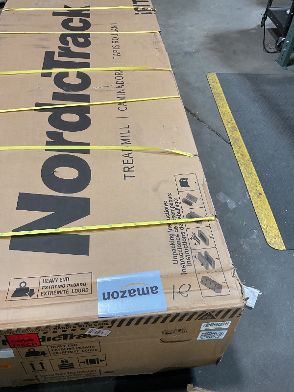 Photo 1 of **PLASTIC COVER IS CRACKED**NordicTrack Commercial 2450 Treadmill with iFIT