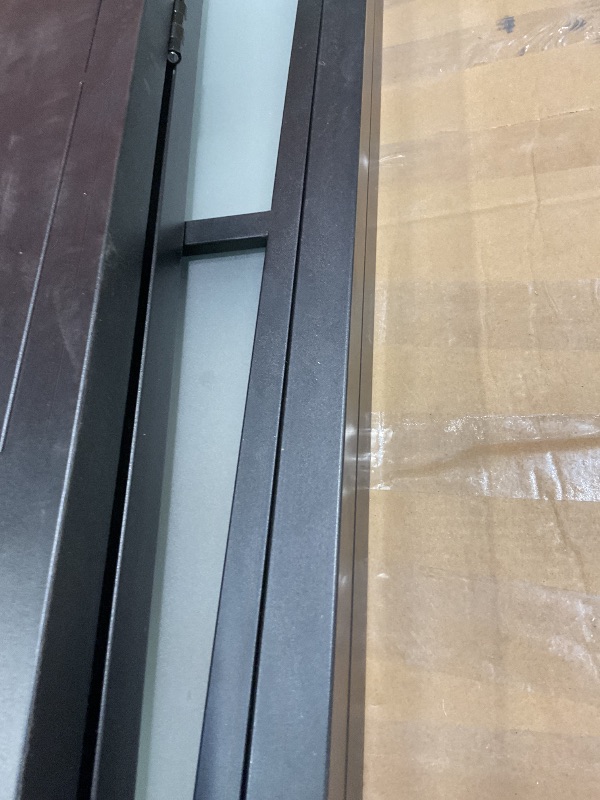 Photo 1 of **MINOR USE WEAR**Calhome 48 in. x 84 in. 3/4 Lites Frosted Glass Black Steel Frame Double Bi-Fold Barn Doors with Hardware Kit and Door Handle