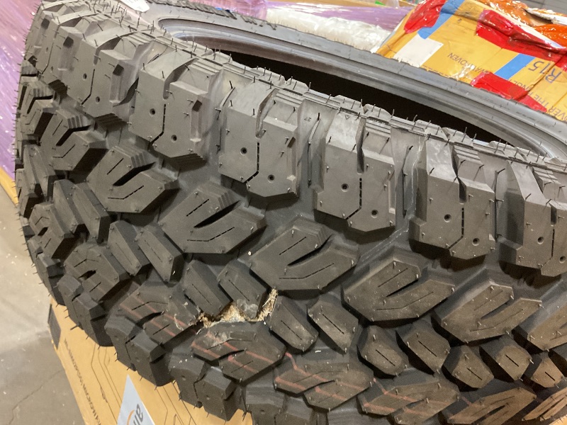 Photo 1 of **DIRT. MINOR USE WEAR**Rough Country 285/55R20 Overlander M/T Tire - 97010125