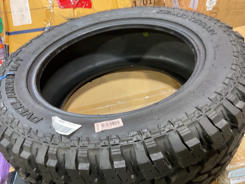 Photo 1 of **DIRT. MINOR USE WEAR**Rough Country 285/55R20 Overlander M/T Tire - 97010125