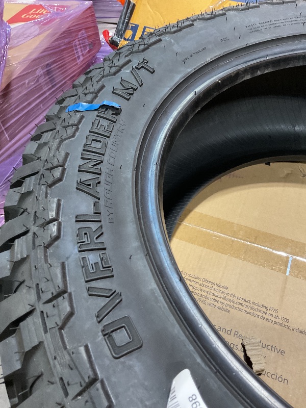 Photo 1 of **DIRT. MINOR USE WEAR**Rough Country 285/55R20 Overlander M/T Tire - 97010125
