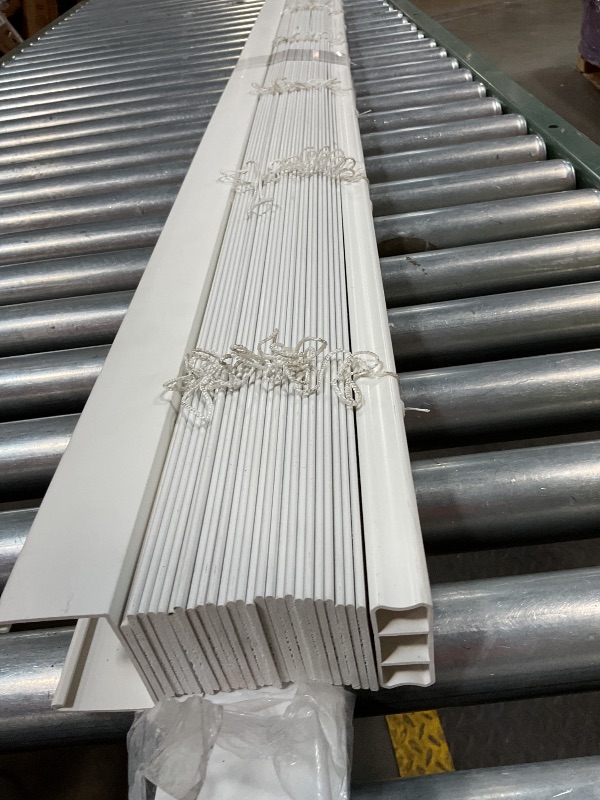 Photo 1 of **SELLING FOR PARTS AS PARTIAL SET. SCUFFS AND DIRT. MISSING HARDWARE. MISSING CONTROL ROD** DEZ FURNISHINGS Cordless 2" Signature Smooth Faux Wood Blind, 59.5" W x 48" H, Smooth White