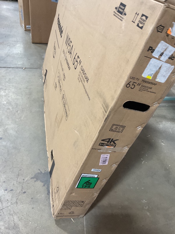 Photo 1 of **MAJOR DAMAGE TO SCREEN. SELLING FOR PARTS **Panasonic W95 Series 65-inch Mini LED 4K Ultra HD Smart Fire TV, Sport Stadium Mode, ATSC3.0, Dolby Vision IQ, Dolby Atmos, HDR10+ Adaptive, Press and Ask Alexa, 144Hz, Wall-mountable - 65W95AP