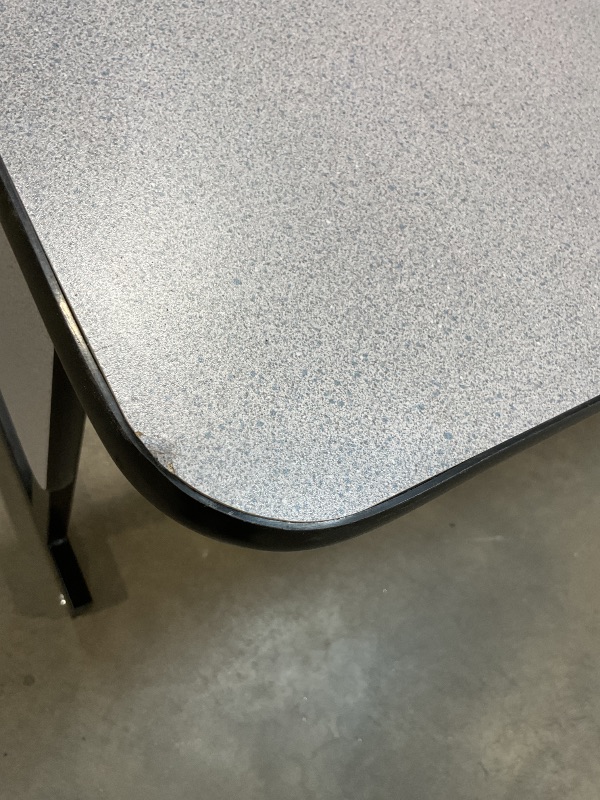 Photo 1 of **LEG HOLDER COMING LOOSE**DENT. SCRAPES AND SCRATCH FROM TRANSPORT **Correll 24" x 60" Gray Granite Thermal-Fused Laminate Top Folding Seminar Table with Panel Legs