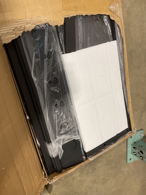 Photo 1 of **PARTIAL SET** Box of Bed frame parts. Black upholstery and black frame.