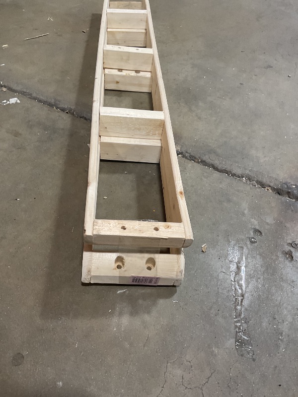 Photo 1 of **CHIPPED**Wood frames with drill holes. Curved ends