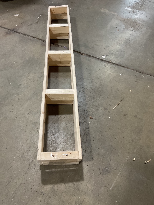 Photo 1 of **CHIPPED**Wood frames with drill holes. Curved ends