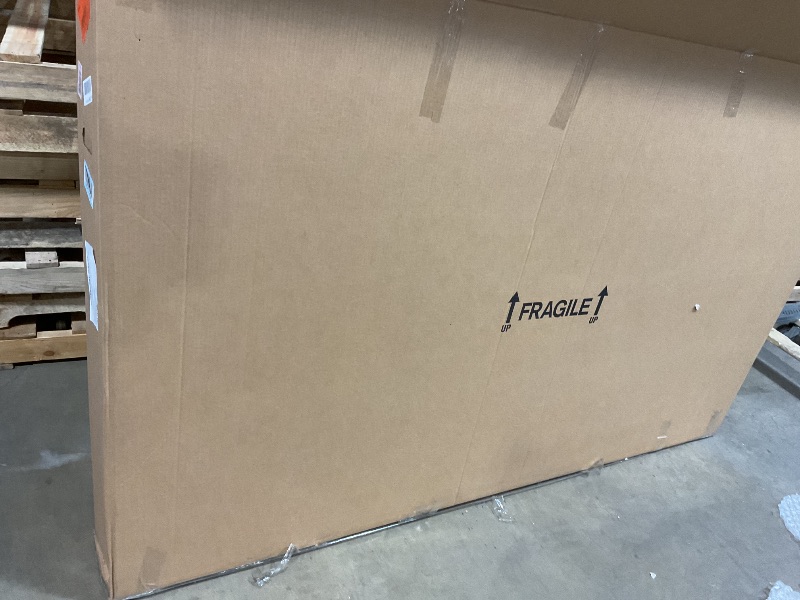 Photo 1 of **Amazon Fire TV 65" Omni QLED Series 4K UHD smart TV, Dolby Vision IQ, Fire TV Ambient Experience, local dimming, hands-free with Alexa