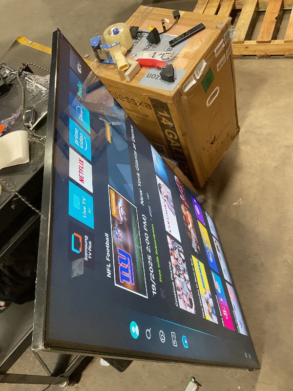 Photo 1 of **FRAME DENT ON CORNER **Samsung - 55” Class Q8F Series QLED 4K UHD SamsungVision AI Smart Tizen TV 