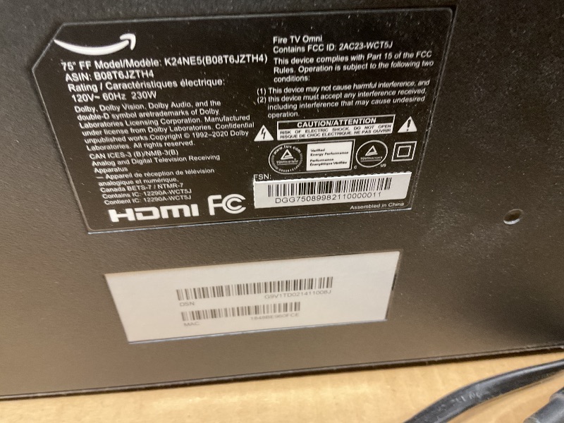Photo 1 of **SELLING FOR PARTS. MAJOR DAMAGE TO SCREEN. MISSING REMOTE. **Amazon Fire TV 75" Omni Series, 4K UHD smart TV with Dolby Vision, hands-free with Alexa