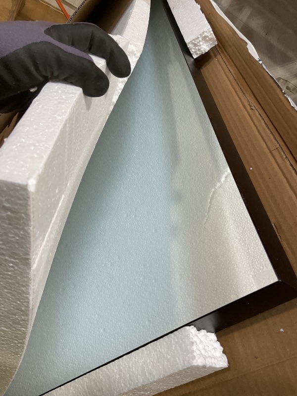 Photo 1 of ***UNKNOWN DAMAGES/UNTESTED*** Black wall mounted mirror