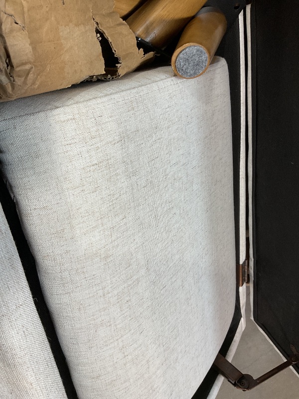 Photo 1 of **DIRT. BOTTOM FABRIC COMING LOOSE. ONE LOOSE HINGE**60 inch bedroom bench with storage and wood legs