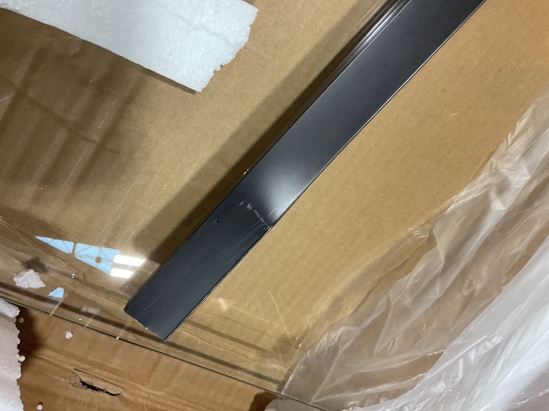 Photo 1 of **METAL FRAMED BENT AND AND DENT**Single fixed panel tempered glass