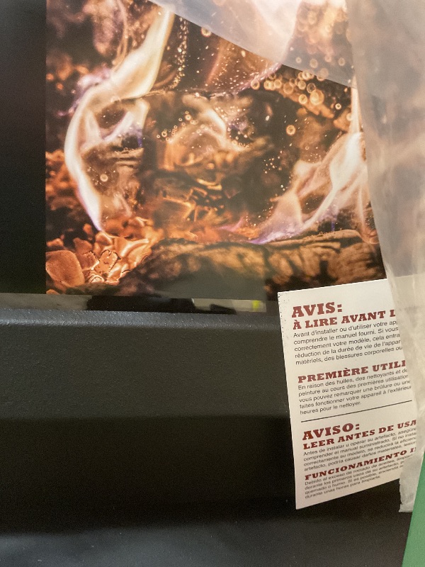 Photo 1 of **SCRAPES ON HANDLE AND SIDE**Huron Medium Wood Stove