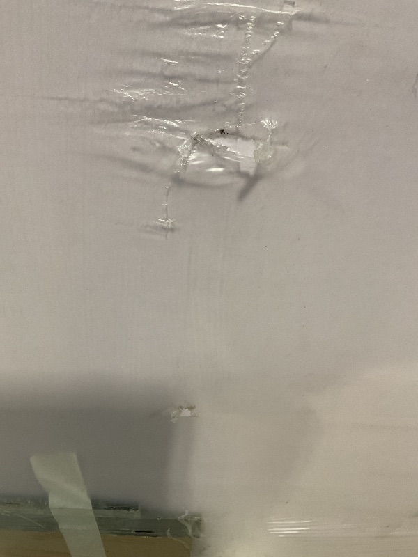 Photo 1 of **MINOR HOLES72*48 whiteboard