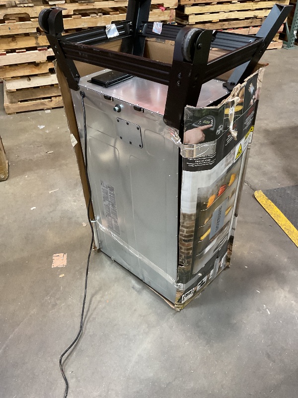 Photo 1 of **SCRAPES. DIRT. DENTS**Masterbuilt® 40-inch Digital Electric Vertical BBQ Smoker with Leg Kit, Side Wood Chip Loader and 970 Cooking Square Inches in Black, Model MB20070122