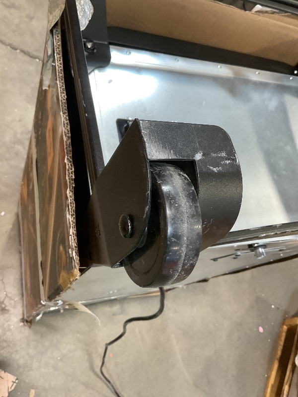 Photo 1 of **SCRAPES. DIRT. DENTS**Masterbuilt® 40-inch Digital Electric Vertical BBQ Smoker with Leg Kit, Side Wood Chip Loader and 970 Cooking Square Inches in Black, Model MB20070122