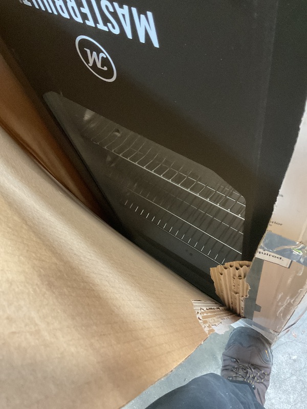 Photo 1 of **SCRAPES. DIRT. DENTS**Masterbuilt® 40-inch Digital Electric Vertical BBQ Smoker with Leg Kit, Side Wood Chip Loader and 970 Cooking Square Inches in Black, Model MB20070122